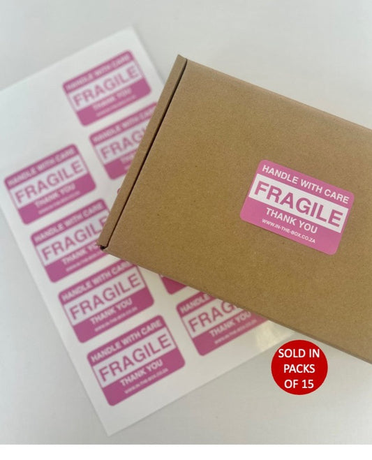 Pink fragile stickers for shipper and mailing boxes or packages